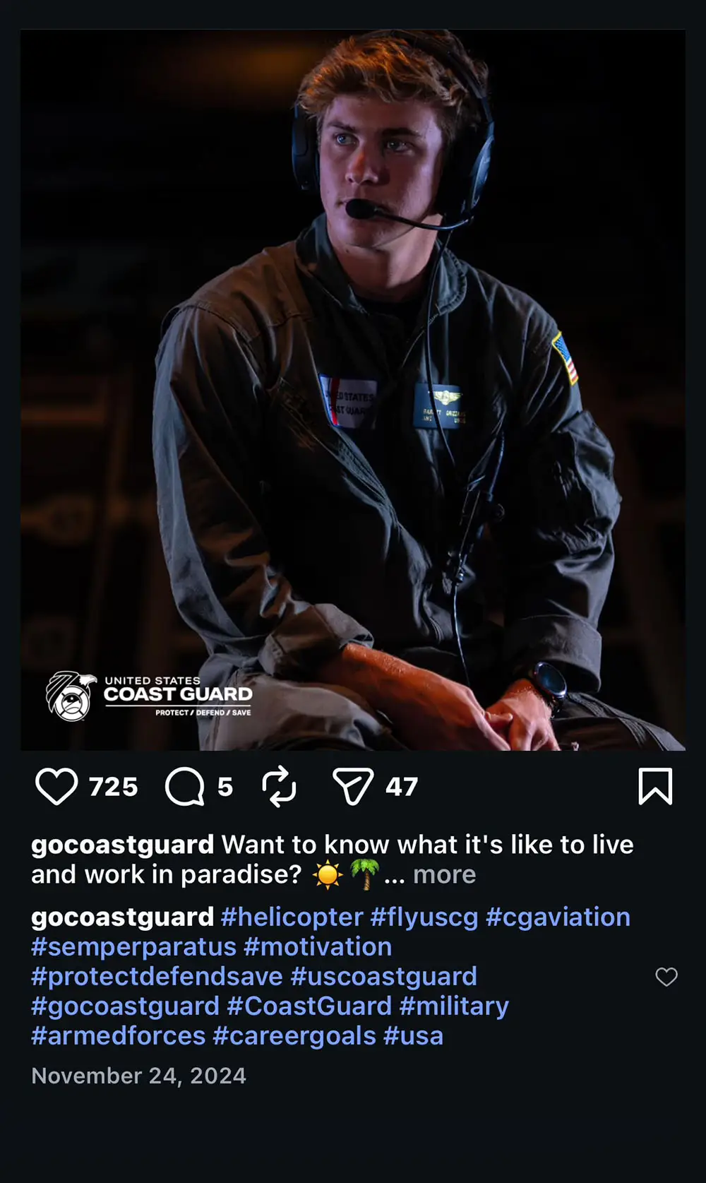 Coast Guard pilot sitting looking off to the side